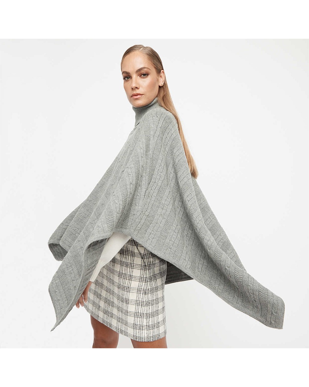 Assemble Knit Poncho