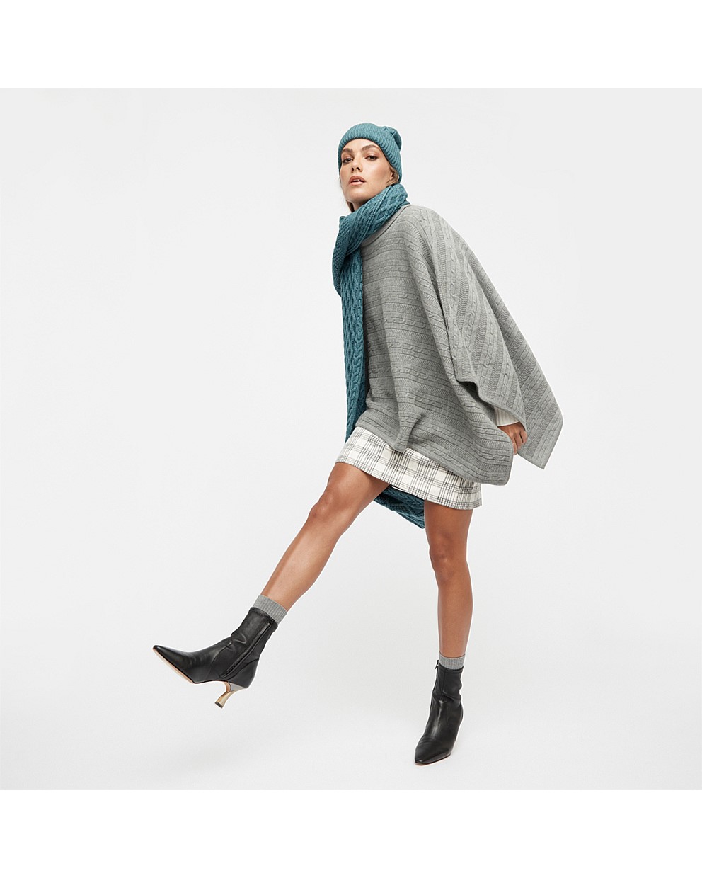 Assemble Knit Poncho