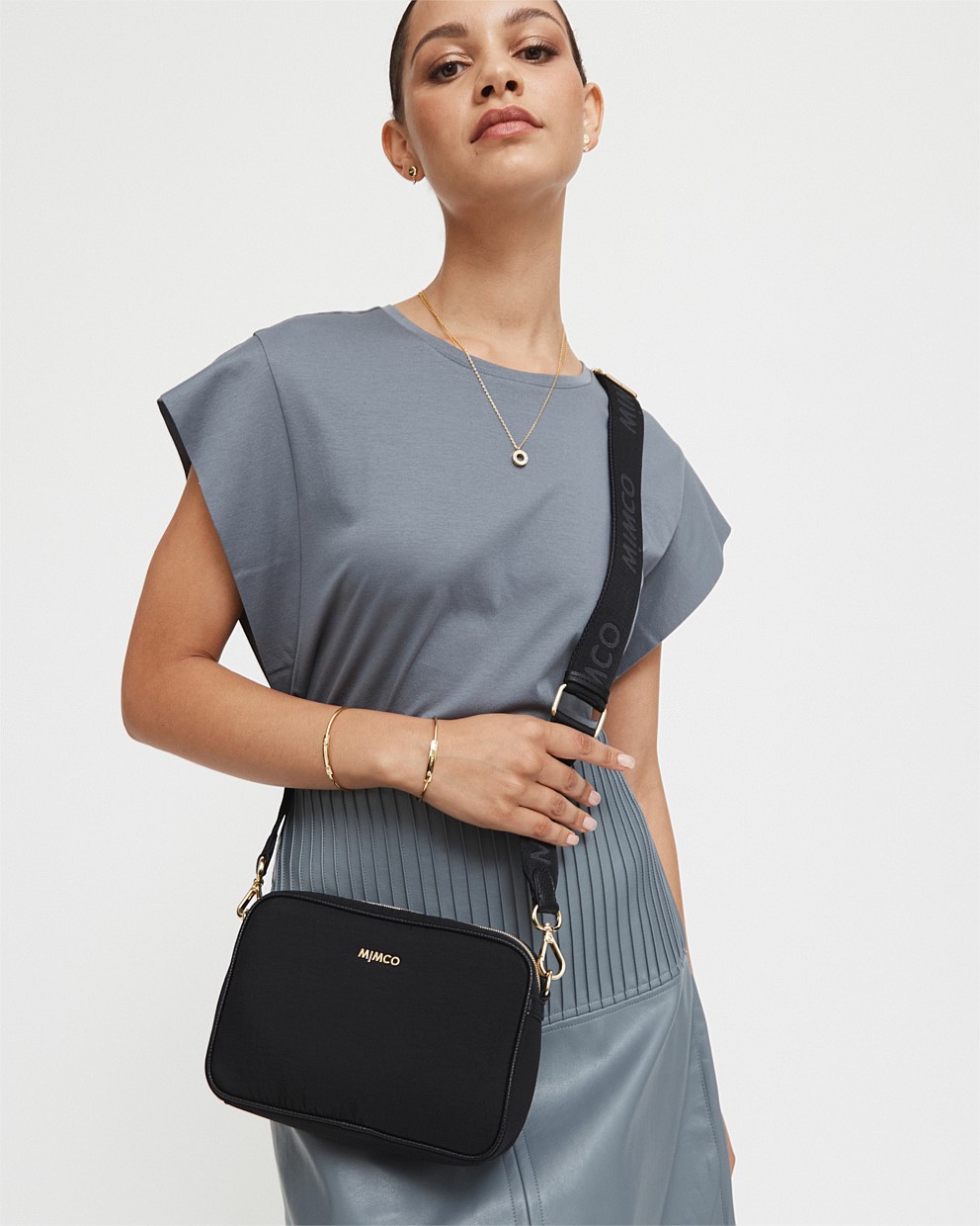 Black Light Gold Flight Camera Crossbody Bag Crossbody Bags Mimco