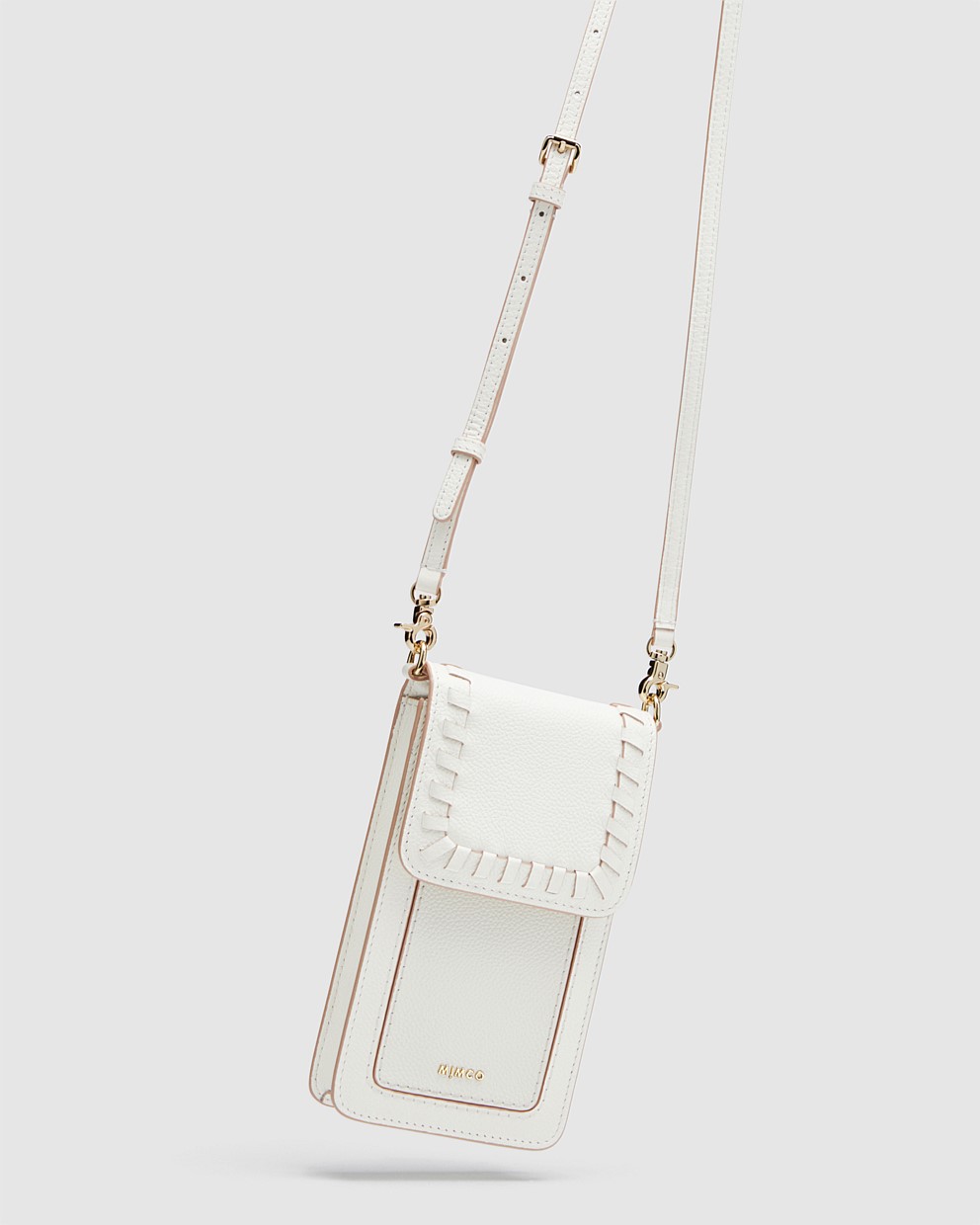 White piazza tech crossbody bag crossbody bags mimco