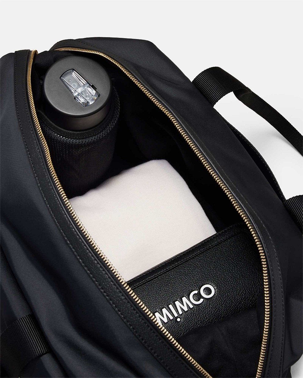 Black Light Gold Mulholland Duffle Bag - Bags | Mimco